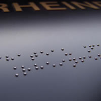 Punktskrift på skilt