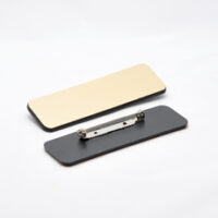 520100560 Jakkeskilt med runde hjørner i gull-sort