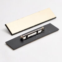 520100990 Jakkeskilt i gull-sort