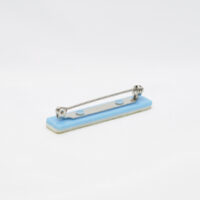 Selvklebende sikkerhetsnål