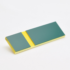 Grønn-gul graveringsplate