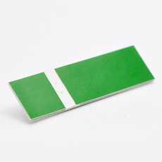 Grønn-hvit graveringsplate